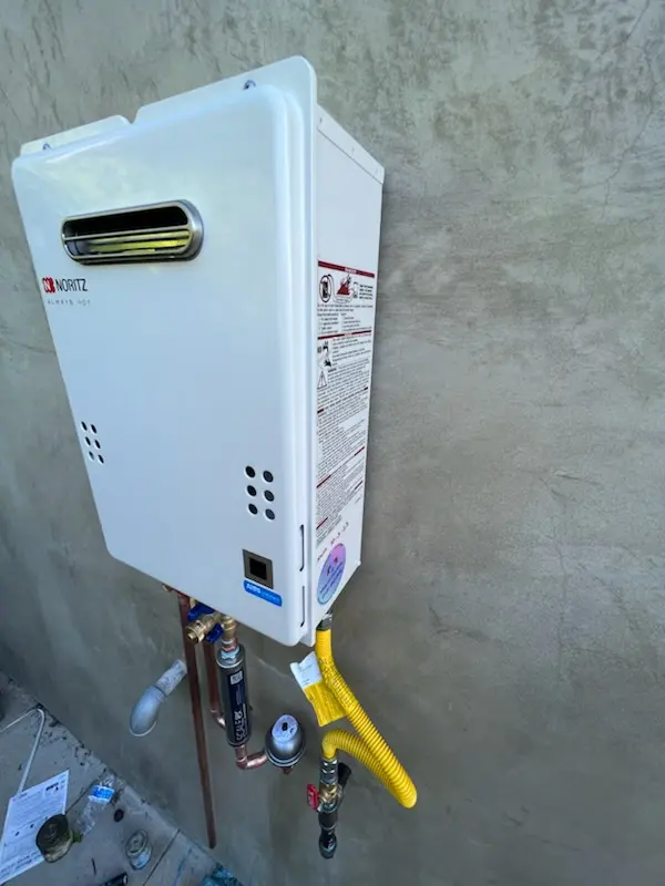 Tankless water heater installation for Windy Hill Manor homes